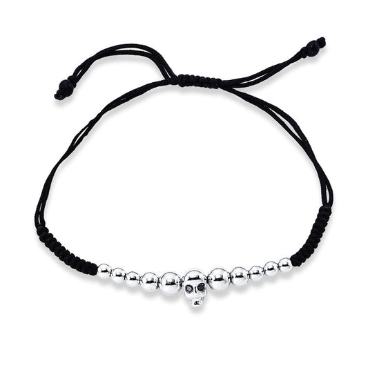 Armband 18 kt WG, black cord, gold ball 3-4mm